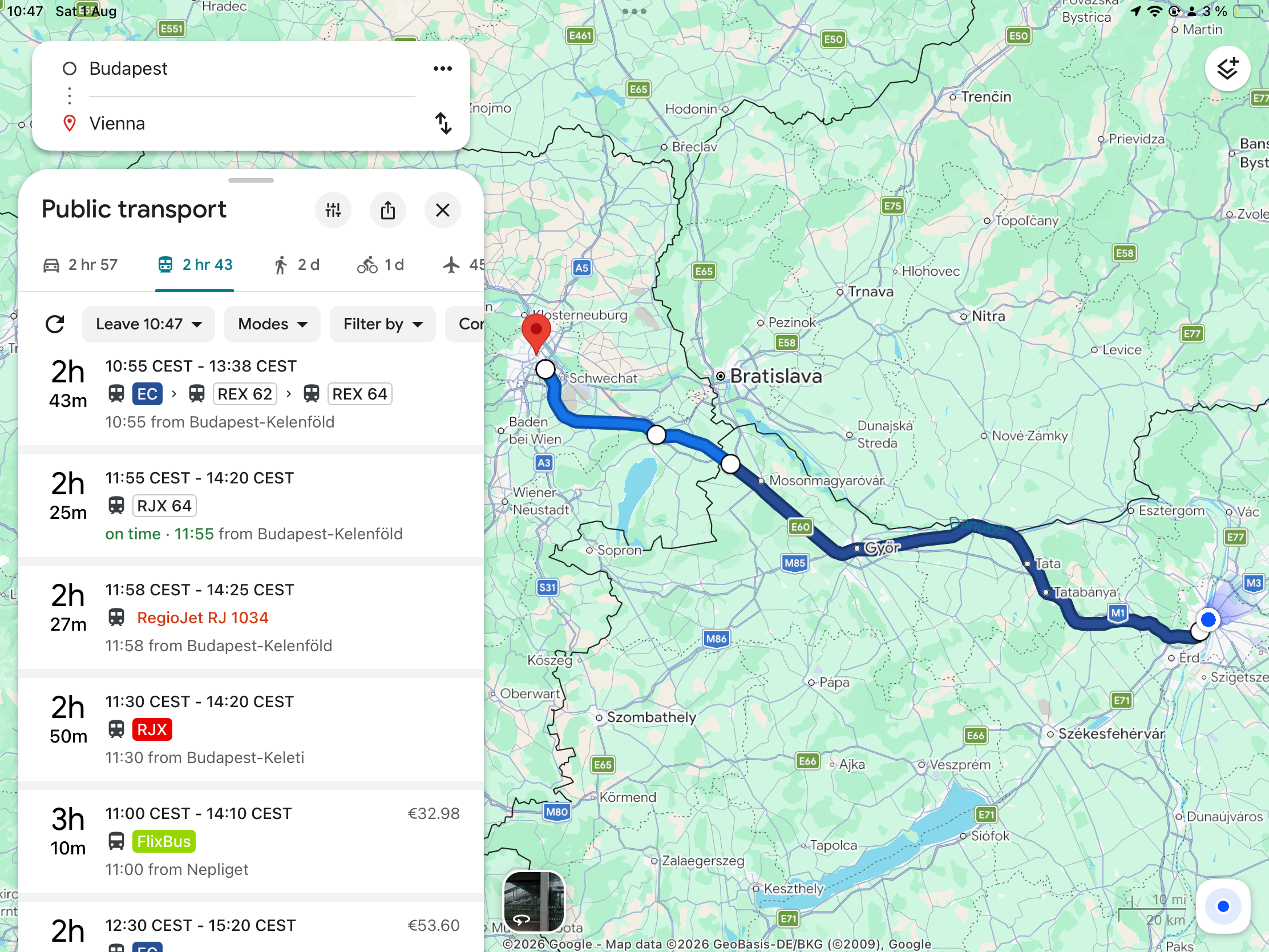 Google Maps public transport options from Budapest to Vienna, showing train routes ranging from 2 hours 25 minutes to 3 hours 10 minutes